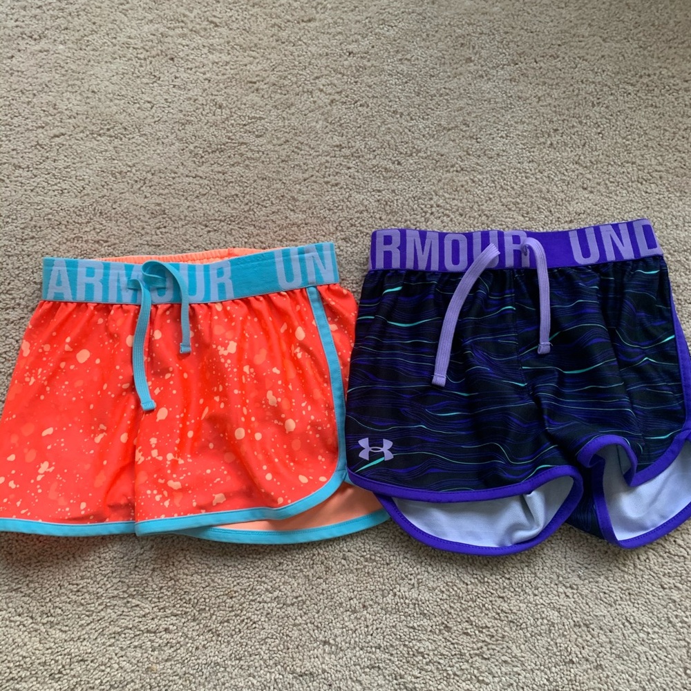 Two pairs of girls under armor shorts size youth S